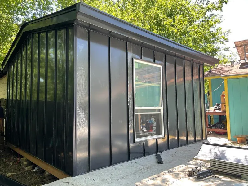 Black standing seam metal wall panels for Roof Inspection in Grovetown